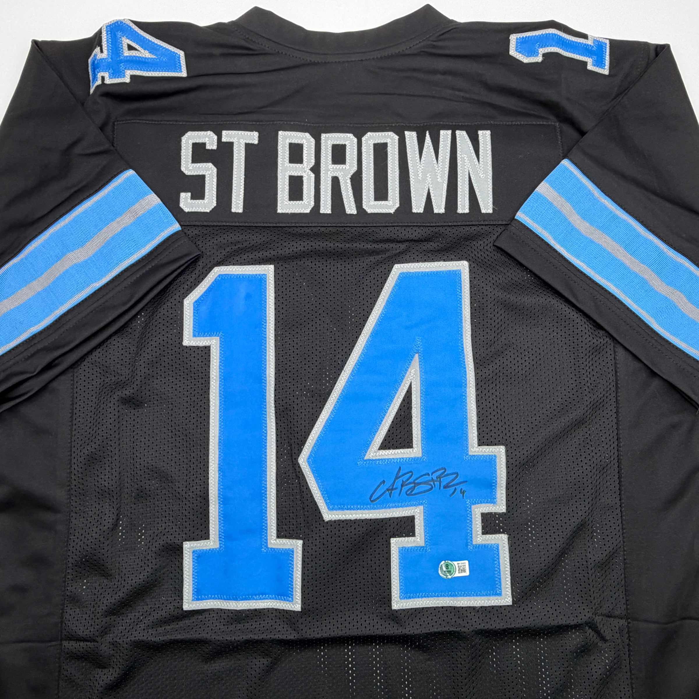 Autographed/Signed Amon-Ra St. Brown Detroit Black Football Jersey Beckett BAS COA - Image 2