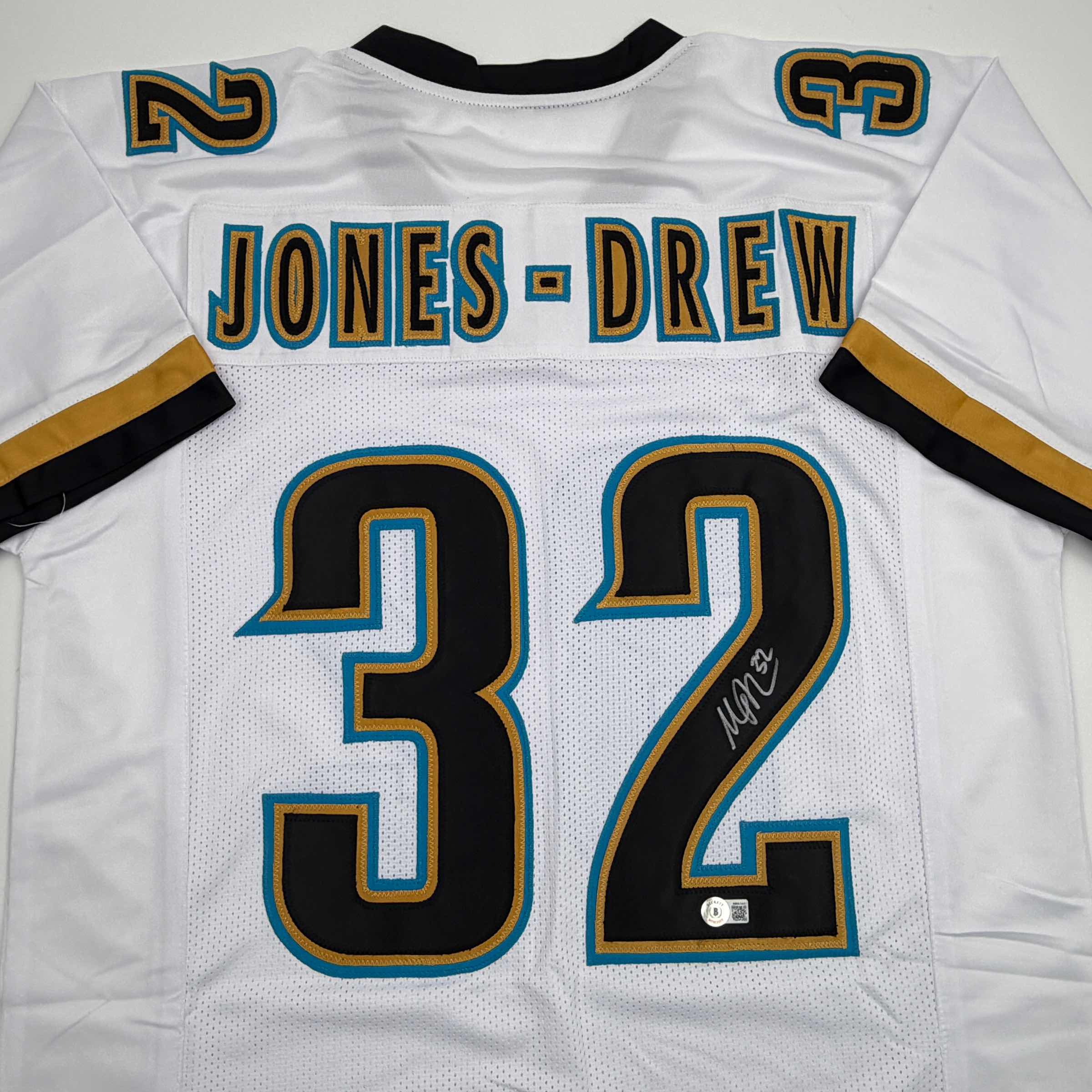 Autographed/Signed Maurice Jones-Drew Jacksonville White Football Jersey Beckett BAS COA - Image 2