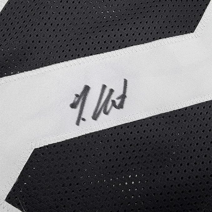 Framed Autographed/Signed Travis Hunter 35x39 Jacksonville Black Football Jersey Beckett BAS COA - Image 2